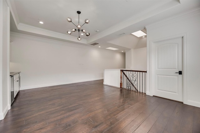 5513 Martel Ave, Dallas, TX 75206 - unfurnished room featuring a raised ceiling, crown molding, dark wood-style floors, a chandelier, and recessed lighting