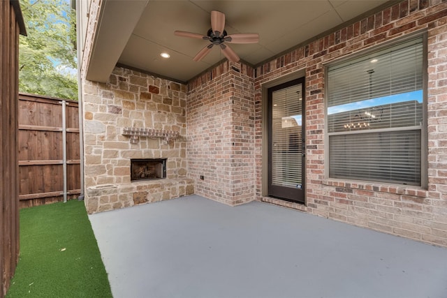 5513 Martel Ave, Dallas, TX 75206 - view of patio / terrace with an outdoor stone fireplace and ceiling fan