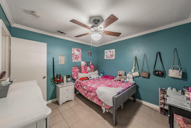 713 Keystone St, Mesquite, TX 75149 - bedroom featuring a textured ceiling, ornamental molding, a ceiling fan, and light tile patterned flooring