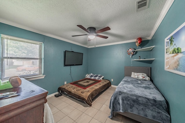 713 Keystone St, Mesquite, TX 75149 - bedroom featuring a textured ceiling, light tile patterned flooring, ornamental molding, and ceiling fan