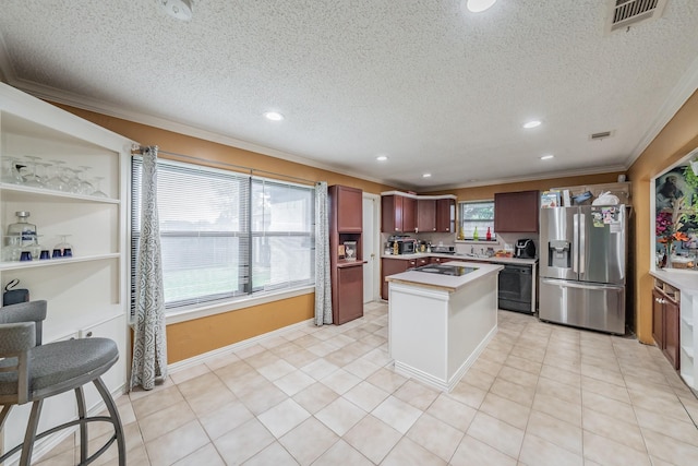 713 Keystone St, Mesquite, TX 75149 - kitchen featuring stainless steel fridge with ice dispenser, ornamental molding, light countertops, dishwasher, and a kitchen island