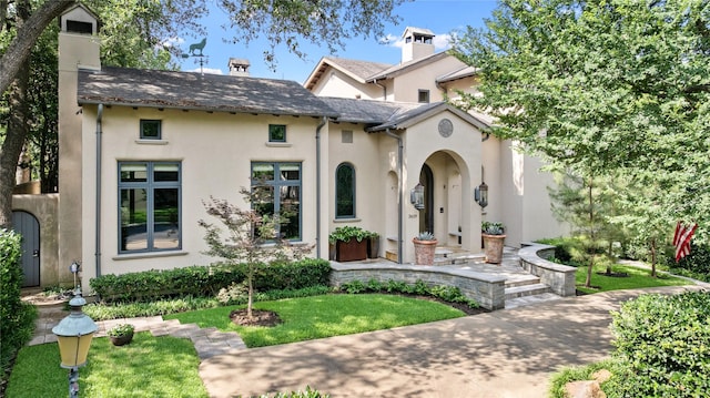 3619 Harvard Ave, Highland Park, TX 75205 - view of front of property with stucco siding and a front lawn