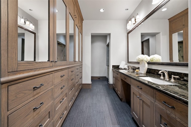 3619 Harvard Ave, Highland Park, TX 75205 - full bathroom with double vanity, wood finished floors, and recessed lighting