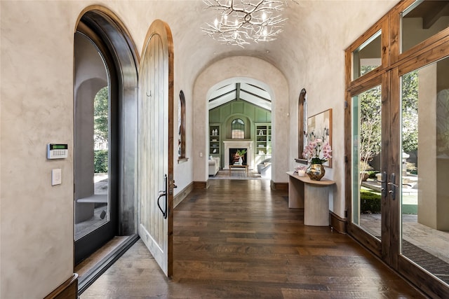 3619 Harvard Ave, Highland Park, TX 75205 - foyer with a chandelier, wood-type flooring, plenty of natural light, and vaulted ceiling