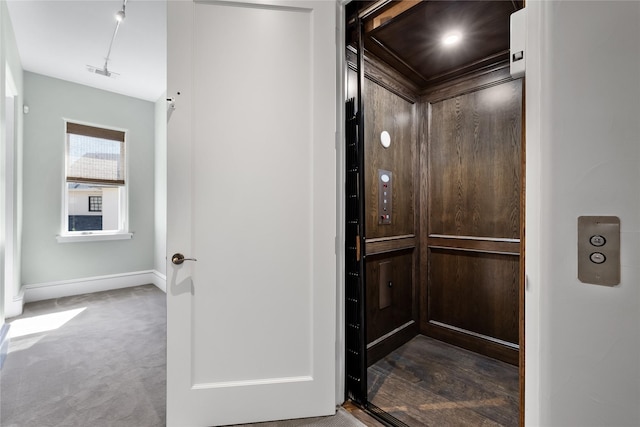 3619 Harvard Ave, Highland Park, TX 75205 - elevator featuring baseboards and carpet floors
