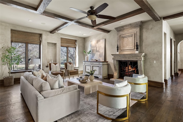 3619 Harvard Ave, Highland Park, TX 75205 - living room with dark wood-type flooring, ceiling fan, a premium fireplace, beam ceiling, and coffered ceiling