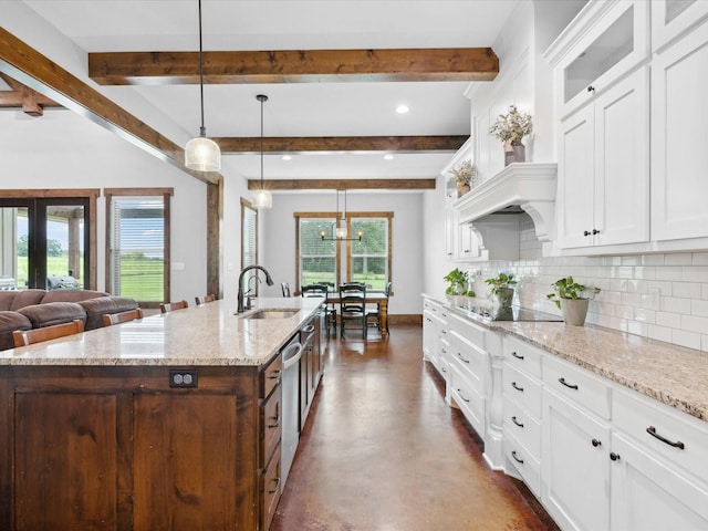 3628 S Fm 1655, Chico, TX 76431 - kitchen with decorative backsplash, plenty of natural light, glass insert cabinets, white cabinetry, and beam ceiling