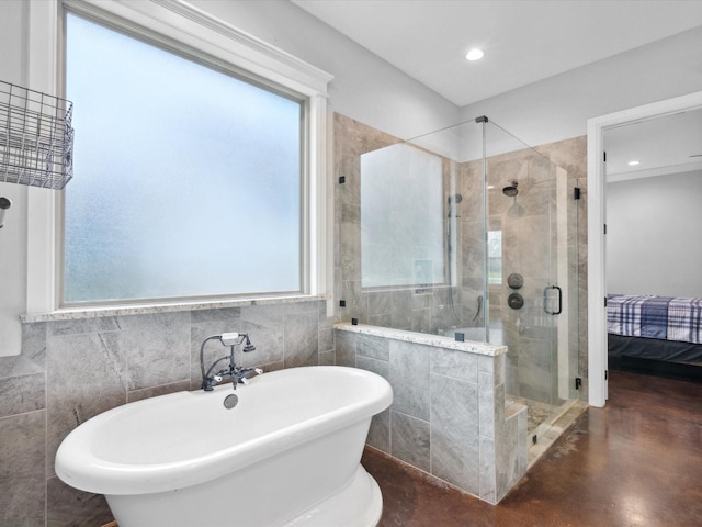3628 S Fm 1655, Chico, TX 76431 - bathroom featuring a soaking tub, a stall shower, healthy amount of natural light, concrete flooring, and recessed lighting