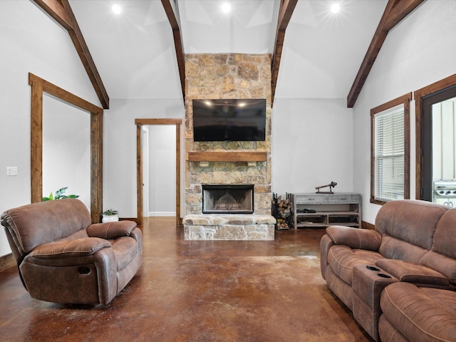 3628 S Fm 1655, Chico, TX 76431 - living area featuring finished concrete floors, beam ceiling, a stone fireplace, high vaulted ceiling, and recessed lighting