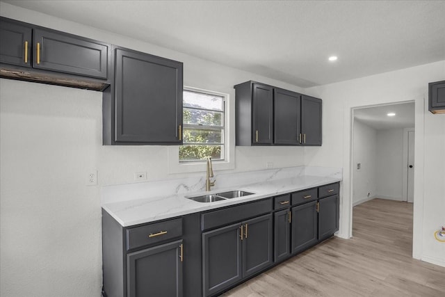 8208 Kender Ln, White Settlement, TX 76108 - kitchen with light wood-style flooring, light stone counters, and recessed lighting