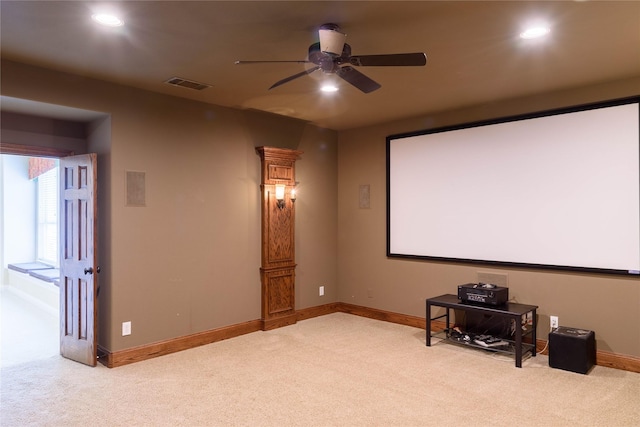 11819 Coronado Trl, Frisco, TX 75033 - home theater room featuring light colored carpet, ceiling fan, and recessed lighting