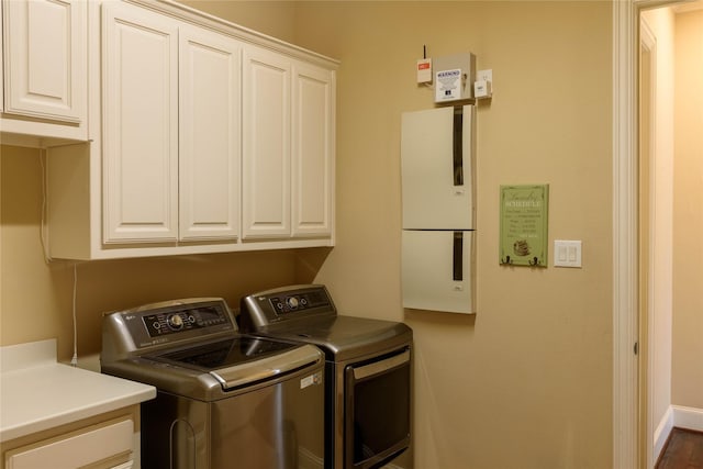 11819 Coronado Trl, Frisco, TX 75033 - laundry room featuring cabinet space and separate washer and dryer
