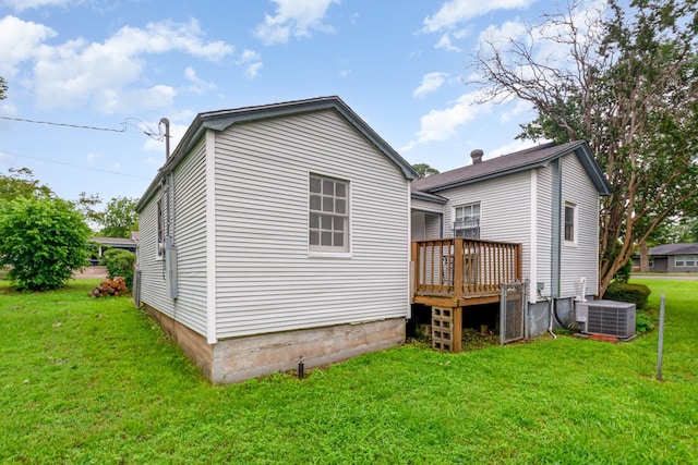 1401 W Shepherd St, Denison, TX 75020 - back of house featuring a deck and a yard