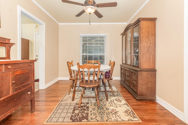 1401 W Shepherd St, Denison, TX 75020 - dining space featuring ceiling fan, wood finished floors, and crown molding