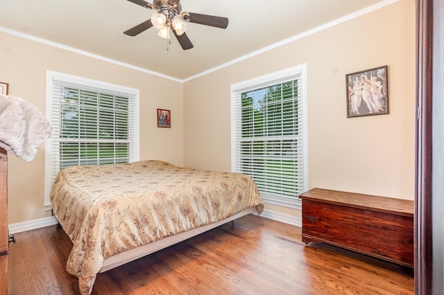 1401 W Shepherd St, Denison, TX 75020 - bedroom with ornamental molding, wood finished floors, and ceiling fan