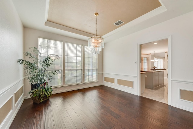 1907 New Haven Rd, Grapevine, TX 76051 - unfurnished dining area featuring a raised ceiling, a chandelier, plenty of natural light, and crown molding