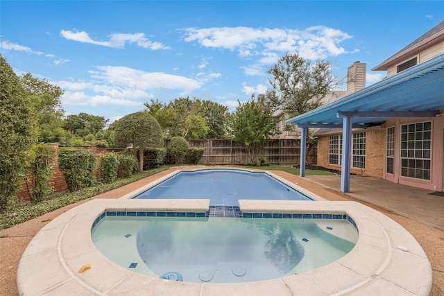 1907 New Haven Rd, Grapevine, TX 76051 - view of swimming pool featuring an in-ground hot tub, a fenced backyard, and a patio area