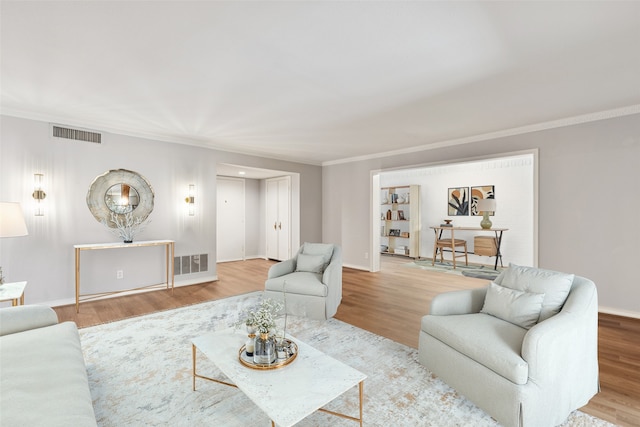 6325 Bandera Ave Unit C, Dallas, TX 75225 - living area featuring ornamental molding and wood finished floors