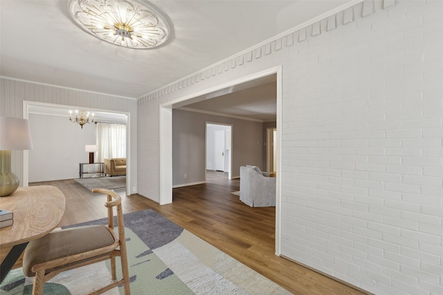 6325 Bandera Ave Unit C, Dallas, TX 75225 - living room with a chandelier, crown molding, and wood finished floors