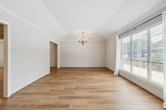 6325 Bandera Ave Unit C, Dallas, TX 75225 - empty room with a chandelier, vaulted ceiling, light wood-style flooring, and ornamental molding