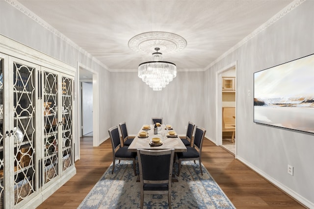 6325 Bandera Ave Unit C, Dallas, TX 75225 - dining area with crown molding, wood finished floors, and a chandelier