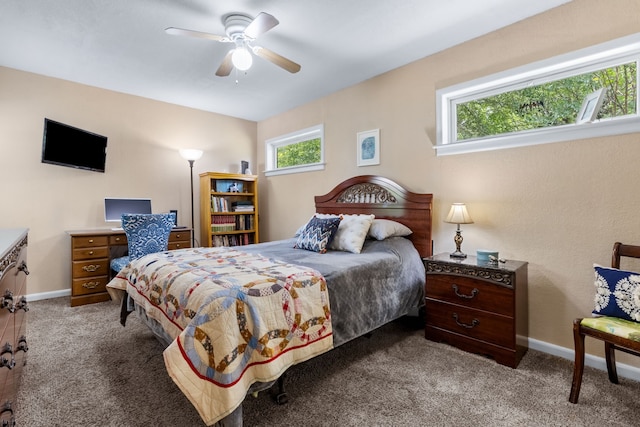 2318 Holsum Cir, Greenville, TX 75401 - carpeted bedroom featuring baseboards and ceiling fan