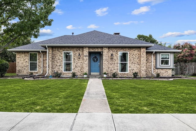 1638 Glencairn Ln, Lewisville, TX 75067 - view of front facade featuring roof with shingles and brick siding