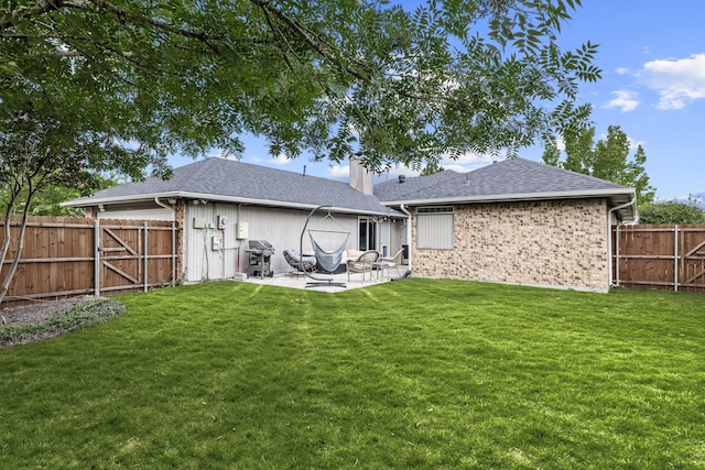 1638 Glencairn Ln, Lewisville, TX 75067 - rear view of property with a patio, a fenced backyard, a chimney, roof with shingles, and a gate