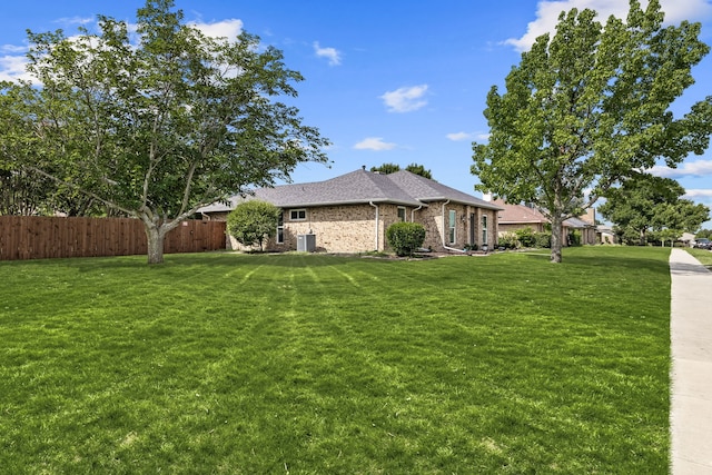1638 Glencairn Ln, Lewisville, TX 75067 - view of home's exterior featuring brick siding and a shingled roof