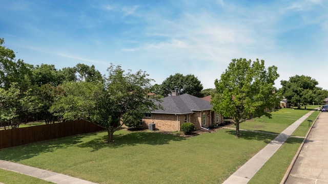 1638 Glencairn Ln, Lewisville, TX 75067 - view of side of property featuring brick siding and a shingled roof