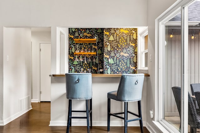 1638 Glencairn Ln, Lewisville, TX 75067 - indoor dry bar featuring wood finished floors and baseboards