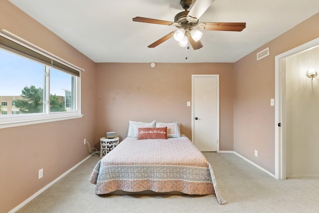 2318 Valleywood Dr, Carrollton, TX 75006 - bedroom with light carpet and a ceiling fan