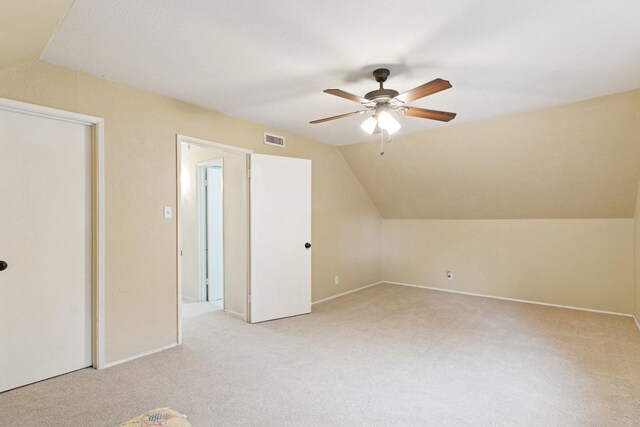 2318 Valleywood Dr, Carrollton, TX 75006 - additional living space featuring vaulted ceiling, a ceiling fan, and carpet floors