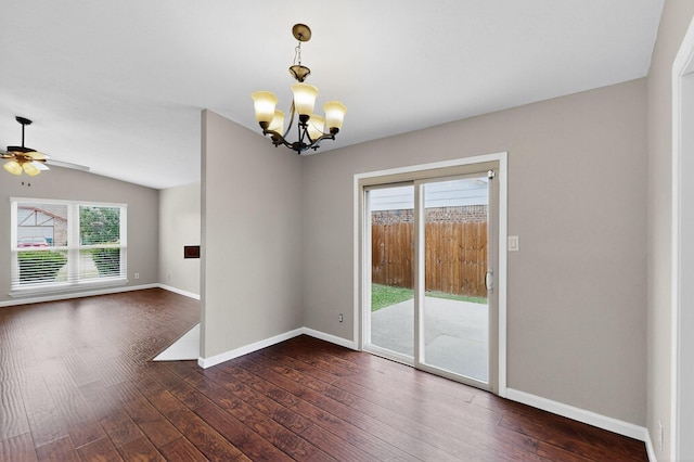 5644 Powers St, The Colony, TX 75056 - empty room featuring dark wood finished floors, a chandelier, plenty of natural light, a ceiling fan, and lofted ceiling