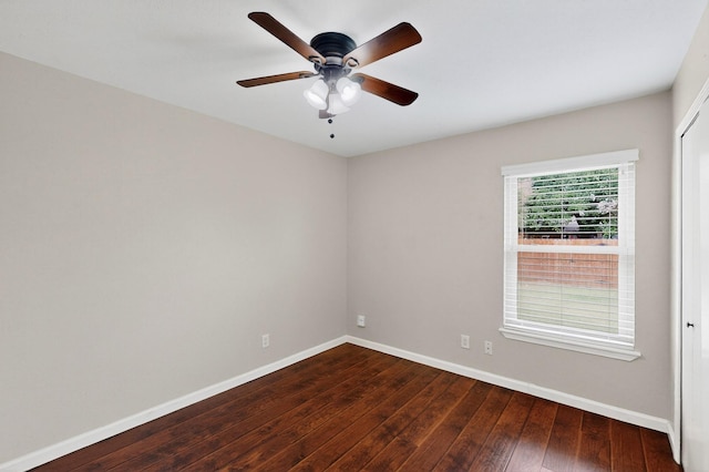 5644 Powers St, The Colony, TX 75056 - empty room featuring dark wood-style floors and a ceiling fan