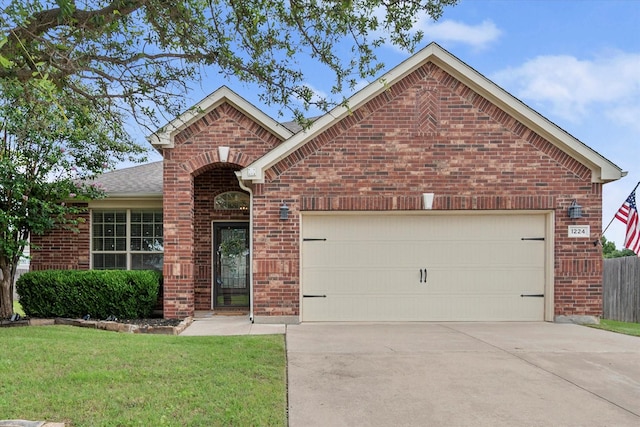 1224 Shelley Dr, Burleson, TX 76028 - view of front of house featuring brick siding, driveway, an attached garage, and a front yard
