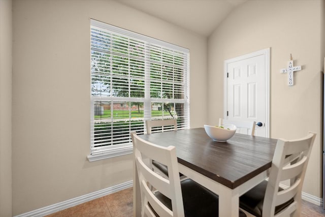 1224 Shelley Dr, Burleson, TX 76028 - dining room with lofted ceiling and tile patterned flooring