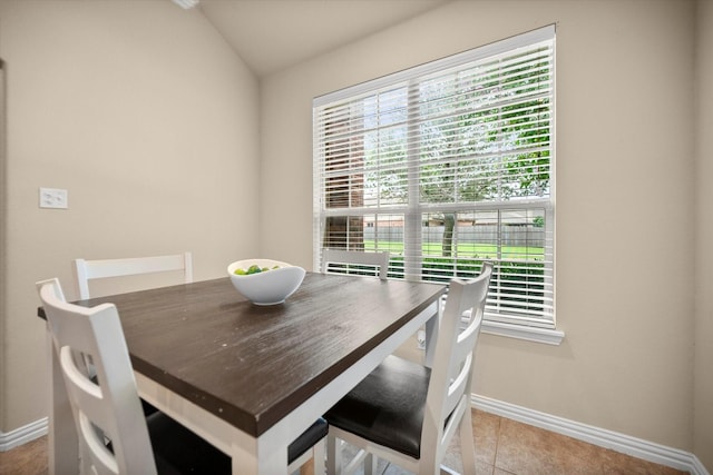 1224 Shelley Dr, Burleson, TX 76028 - tiled dining space with baseboards and vaulted ceiling