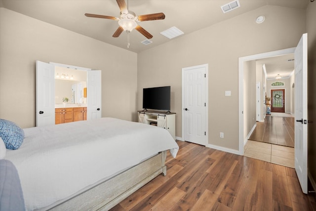 1224 Shelley Dr, Burleson, TX 76028 - bedroom with wood finished floors, a ceiling fan, and connected bathroom