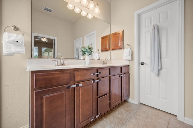 1224 Shelley Dr, Burleson, TX 76028 - full bathroom featuring double vanity, tile patterned flooring, and ceiling fan