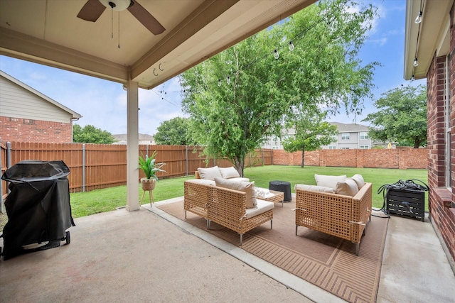 1224 Shelley Dr, Burleson, TX 76028 - fenced backyard with ceiling fan, an outdoor hangout area, a patio, and a grill
