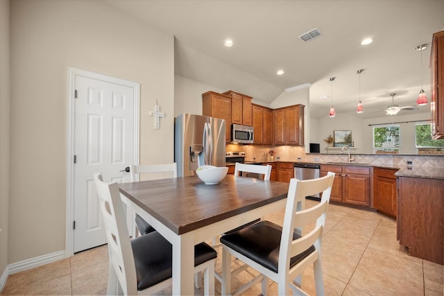 1224 Shelley Dr, Burleson, TX 76028 - dining room featuring vaulted ceiling, light tile patterned floors, recessed lighting, and a ceiling fan
