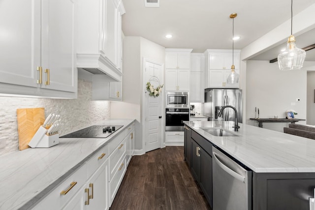 618 Sophia St, Midlothian, TX 76065 - kitchen with stainless steel appliances, white cabinets, backsplash, light stone counters, and dark wood-style floors
