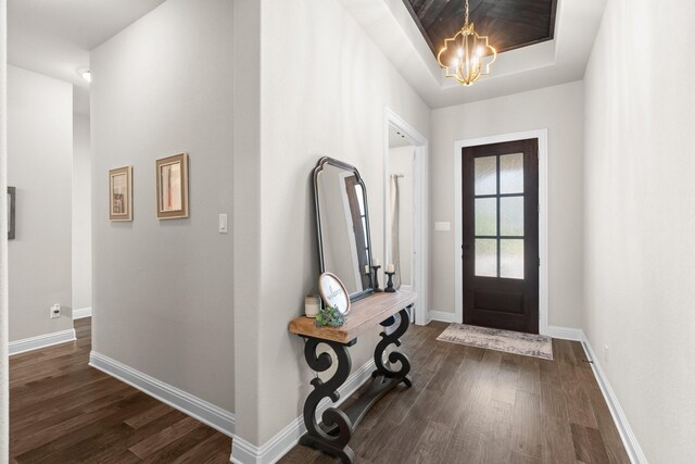 618 Sophia St, Midlothian, TX 76065 - foyer featuring dark wood finished floors, a chandelier, and a raised ceiling