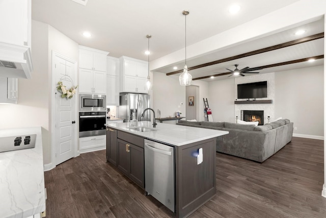 618 Sophia St, Midlothian, TX 76065 - kitchen featuring appliances with stainless steel finishes, a ceiling fan, dark wood-type flooring, white cabinets, and recessed lighting