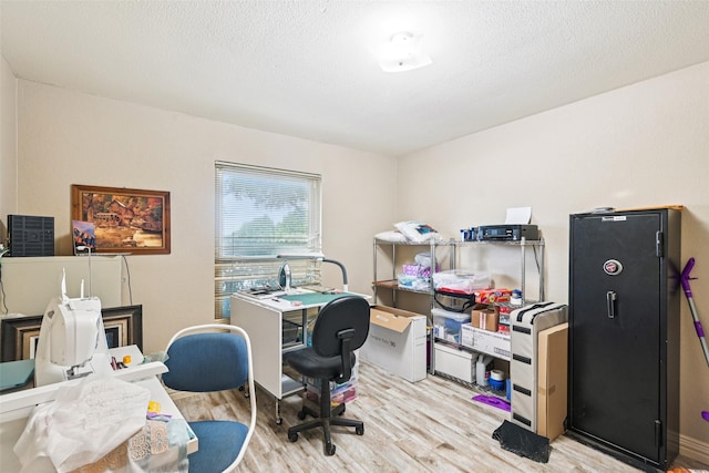 406 Anice Ln, Euless, TX 76039 - home office with light wood finished floors and a textured ceiling