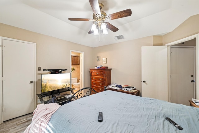 406 Anice Ln, Euless, TX 76039 - bedroom with wood finished floors, ceiling fan, and ensuite bathroom