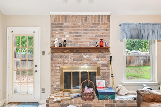 406 Anice Ln, Euless, TX 76039 - living area featuring baseboards and a brick fireplace