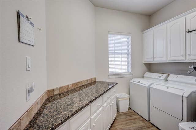 128 Country Club Dr, Heath, TX 75032 - laundry area featuring washer and clothes dryer, cabinet space, and light wood-type flooring