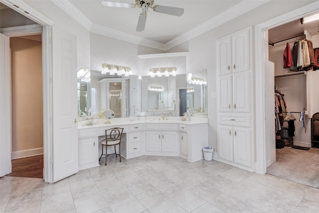 128 Country Club Dr, Heath, TX 75032 - bathroom featuring ornamental molding, a ceiling fan, vanity, and a walk in closet